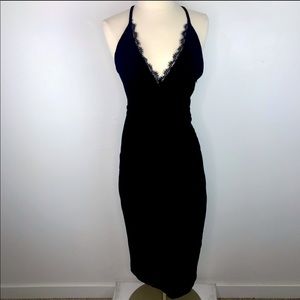 Black plunge dress with lace back